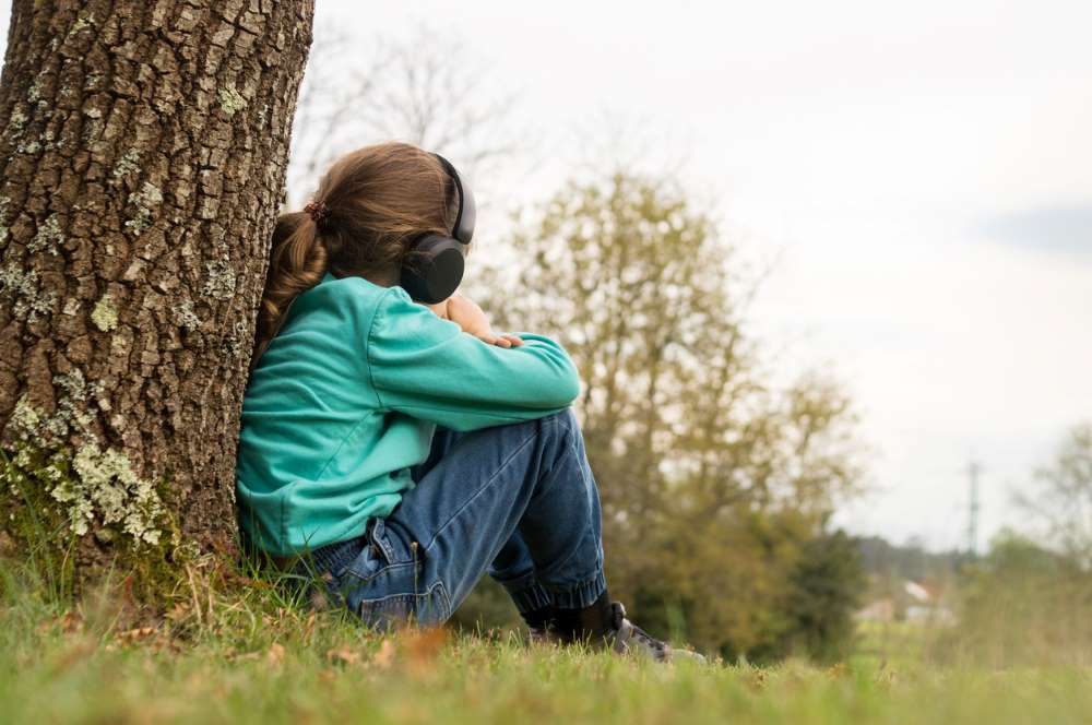 autistic kid wearing headphones