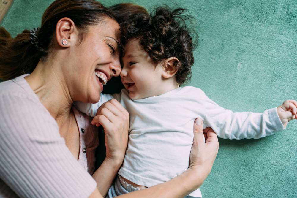 baby tickling and laughing