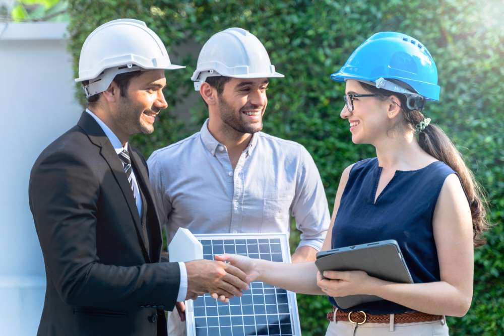 business owner inspecting solar install