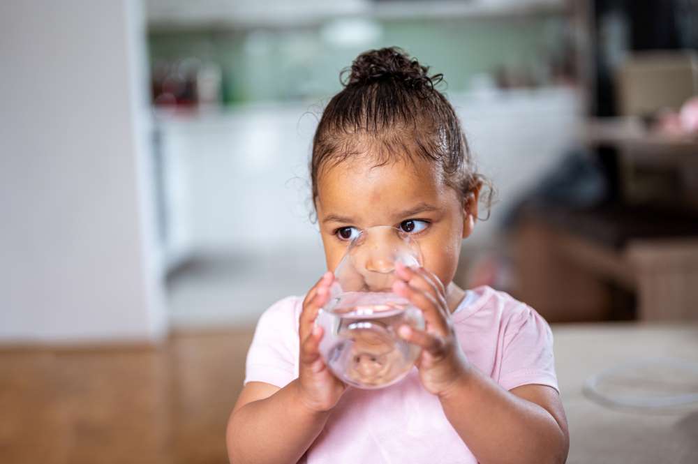 child drinking water