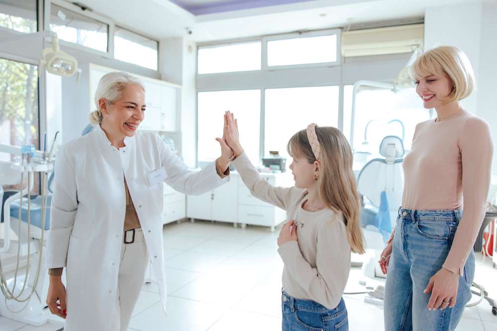 child smiling dental office