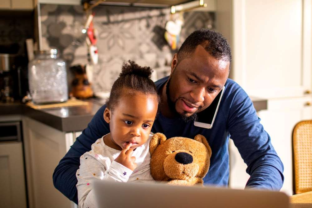 dad working from home with kids