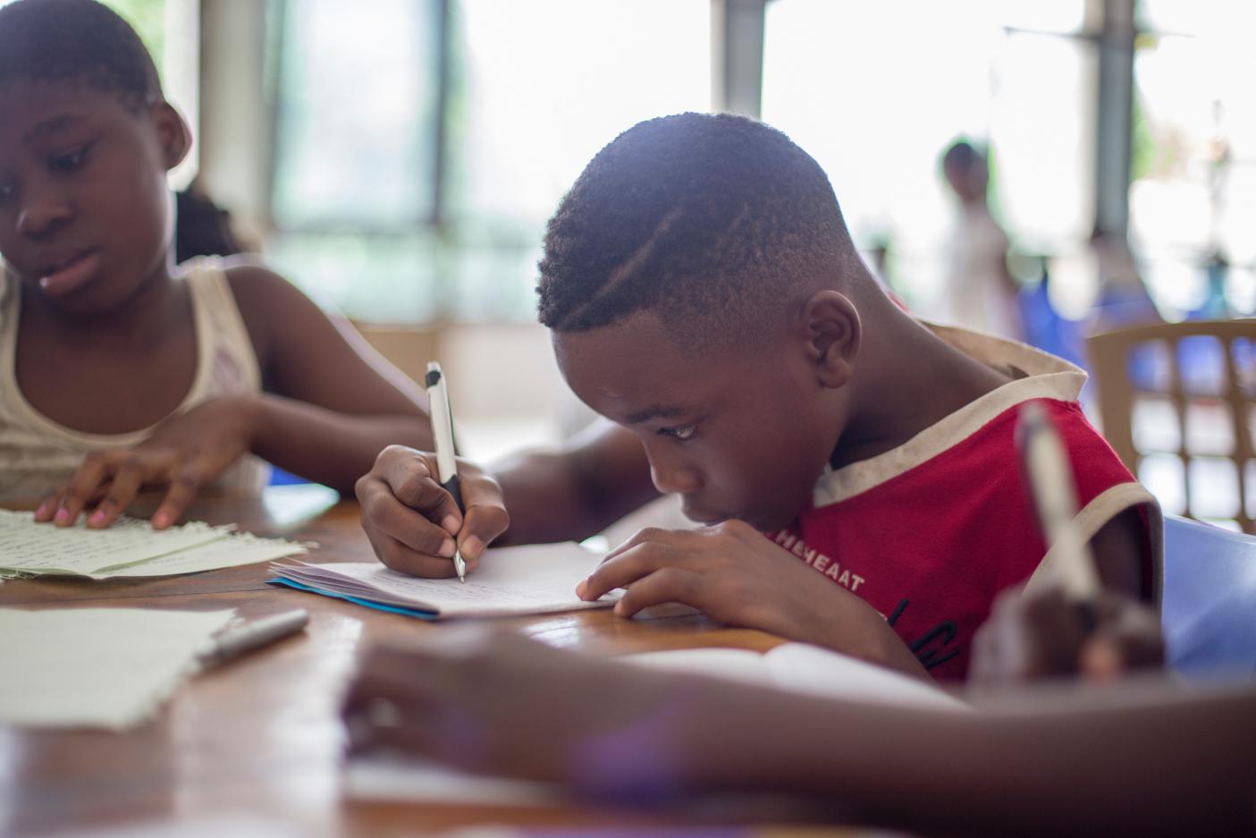 teen doing homework