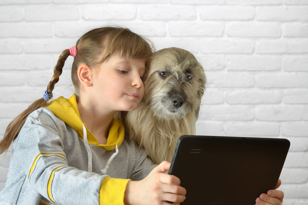 kid and dog selfie