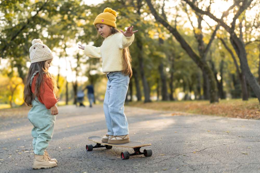kid learning to skateboard