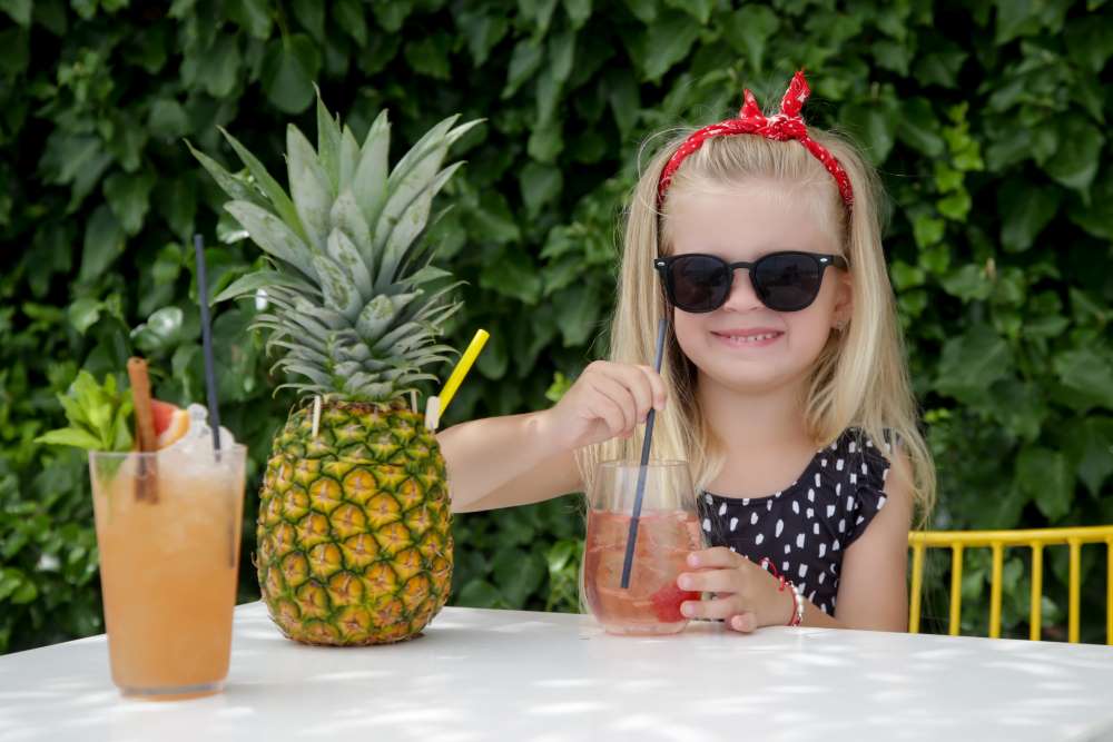 kid outdoors in sunglasses
