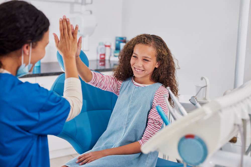 kid visits dental office