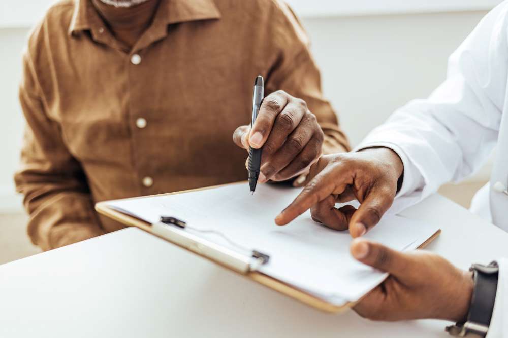 African woman reading document