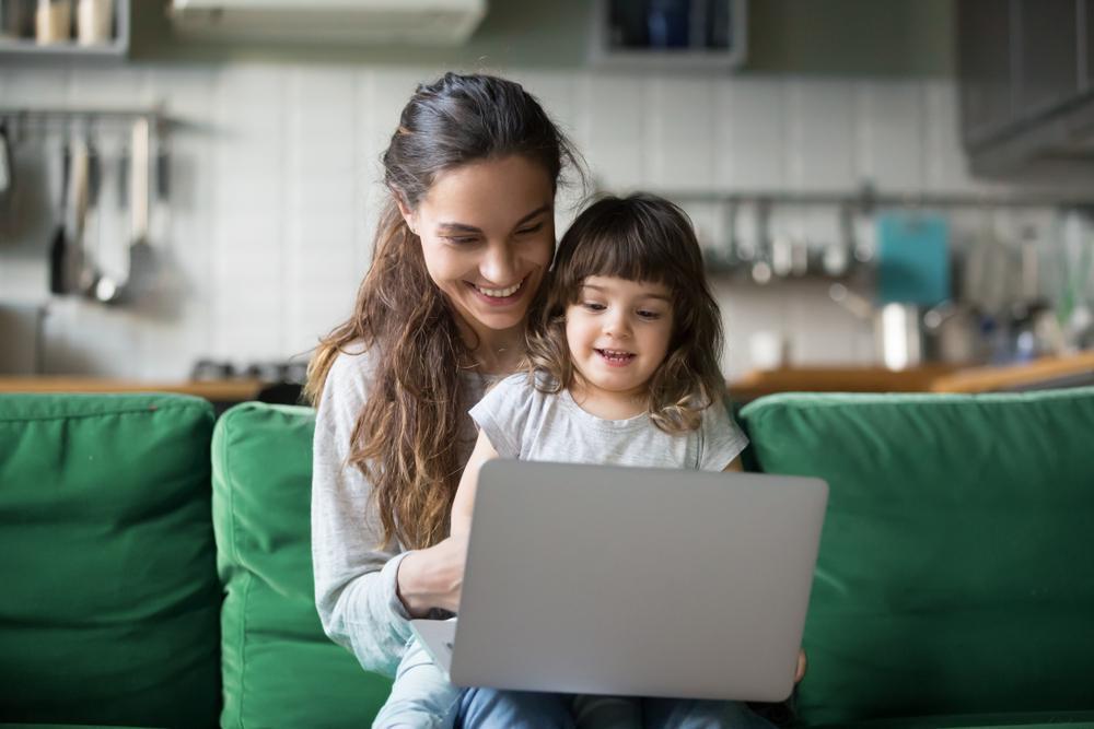 mom and daughter shopping online