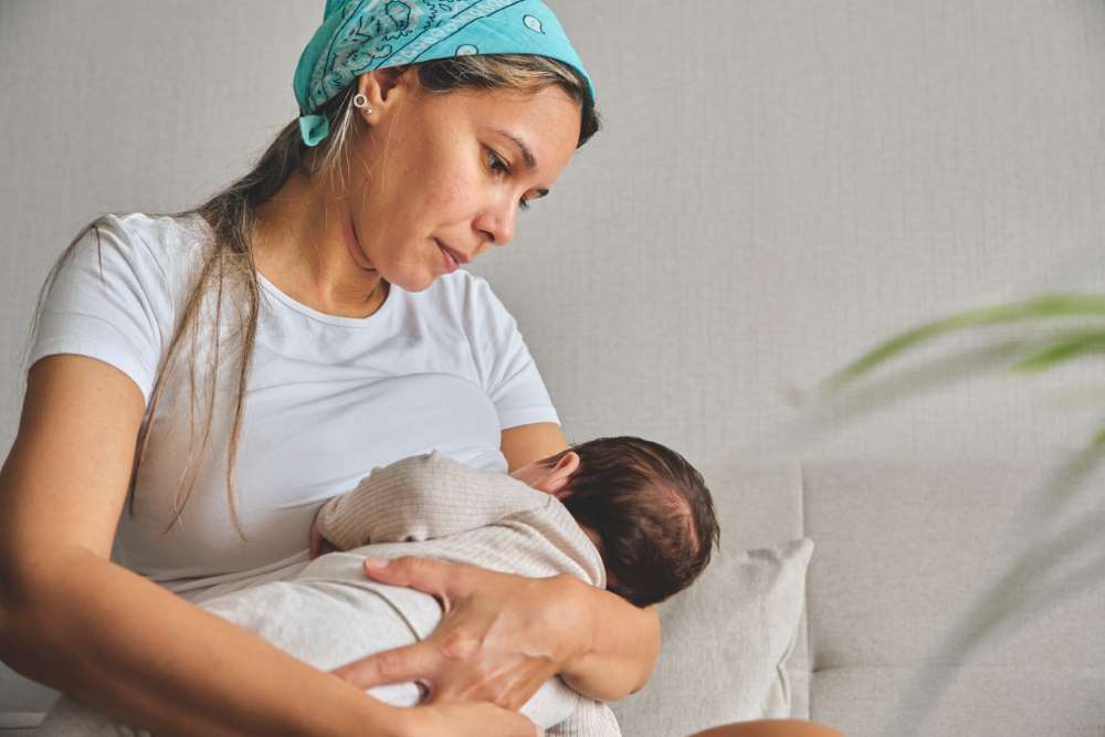 mom holding newborn baby