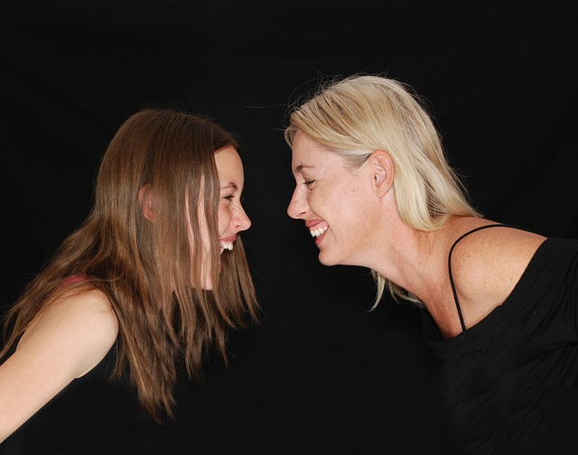 mother and daughter laughing