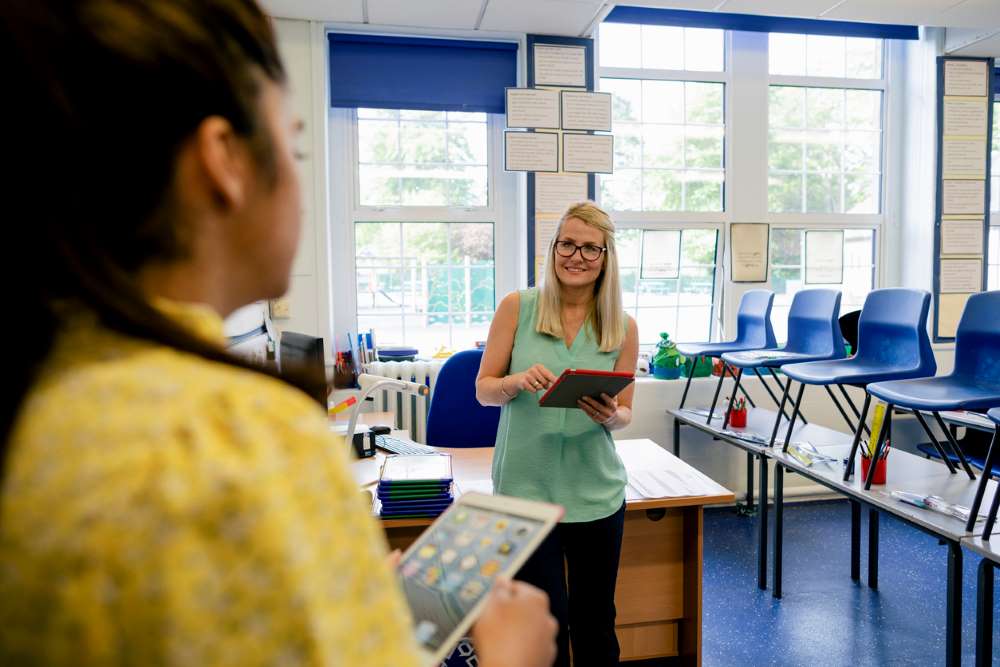 parent and teacher talk in the classroom