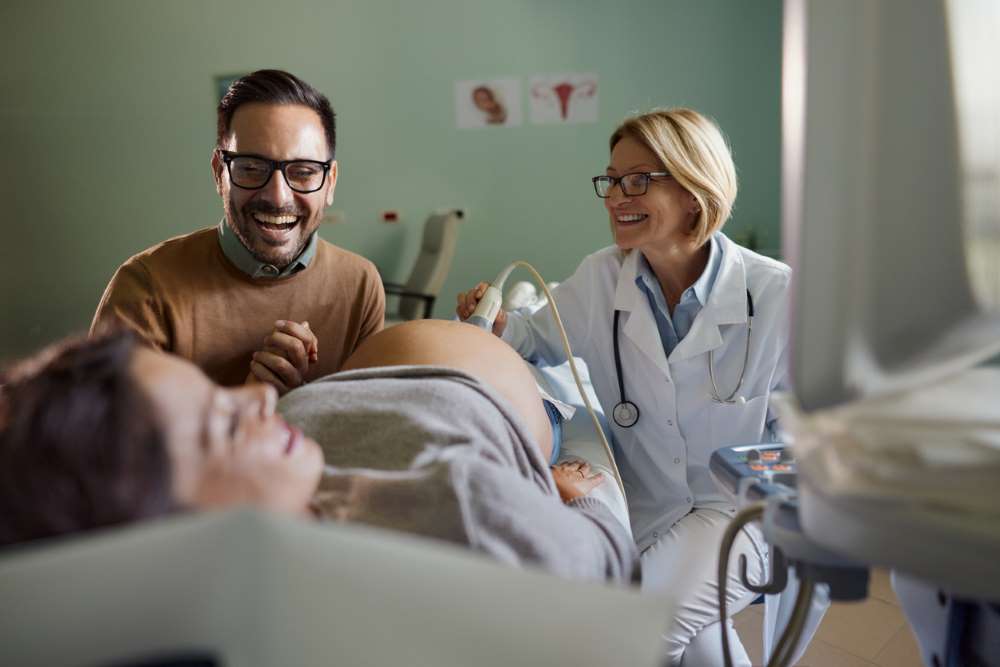 pregnant couple scan