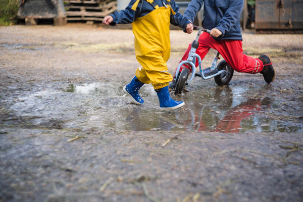 Kids Play Outside in Bad Weather