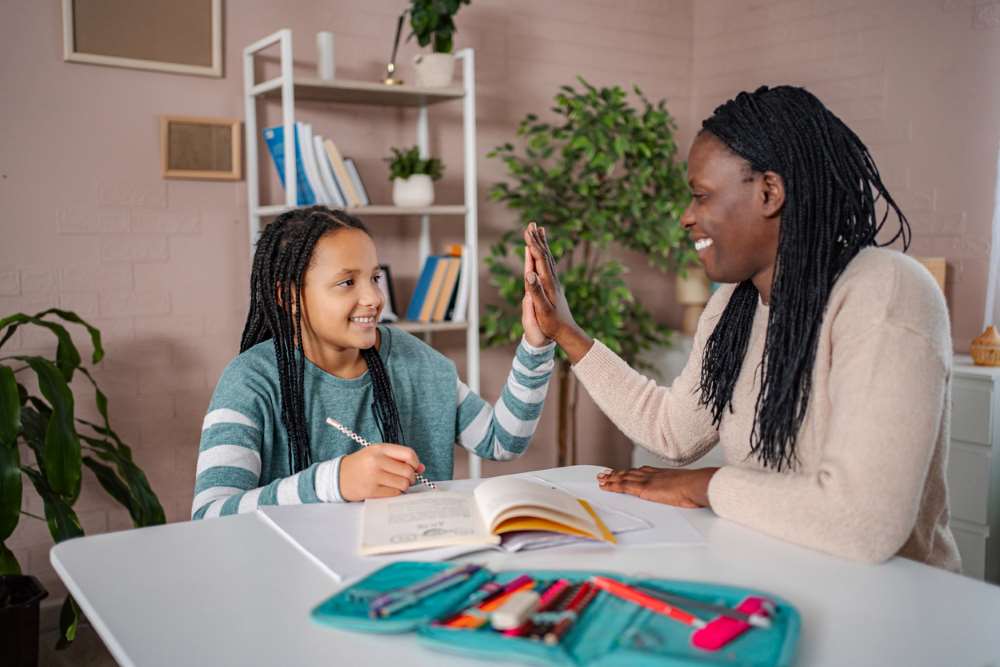 student studying with tutor 