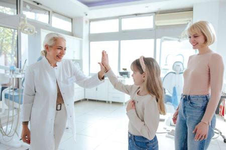 child smiling dental office