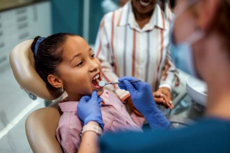 kid at the dentist