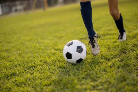 kid playing soccer