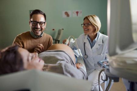 pregnant couple scan