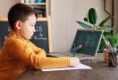 elementary school kid solving math