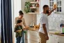 family cleaning kitchen together