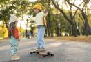 kid learning to skateboard
