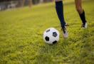 kid playing soccer