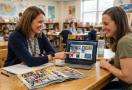 teachers looking at a yearbook