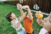 kids-playing-with-bubbles