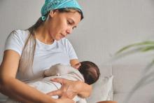 mom holding newborn baby