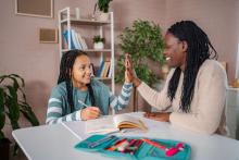 student studying with tutor