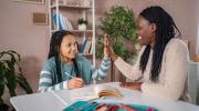 student studying with tutor 