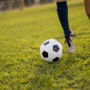 kid playing soccer