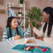 student studying with tutor 