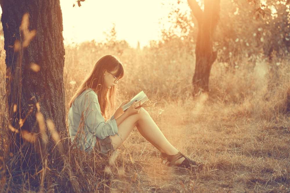 teen reading book